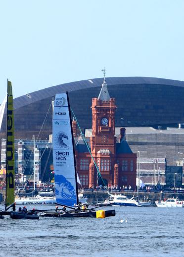 Volvo Ocean Race teams racing infront of Wales Millenium Centre, Cardiff Bay