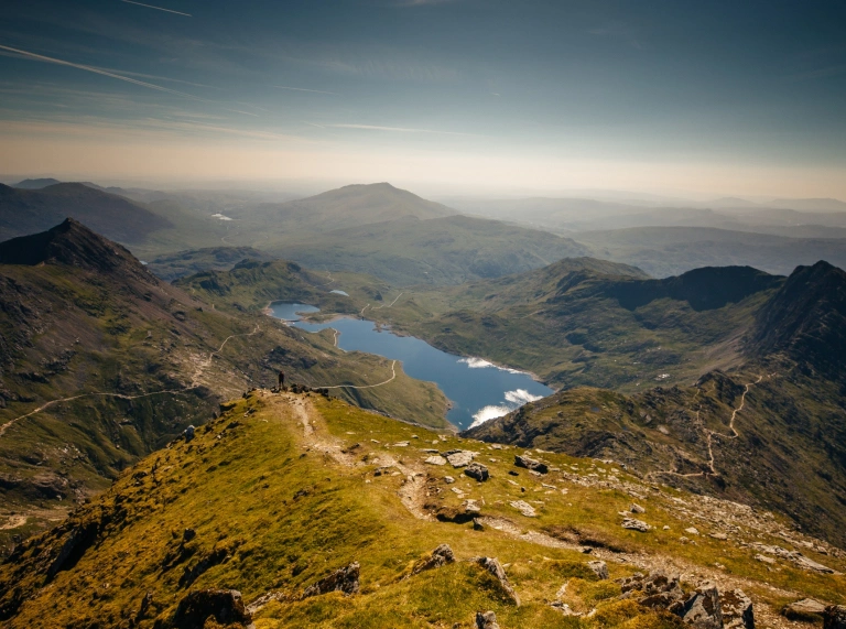 A view of mountains and a lake.