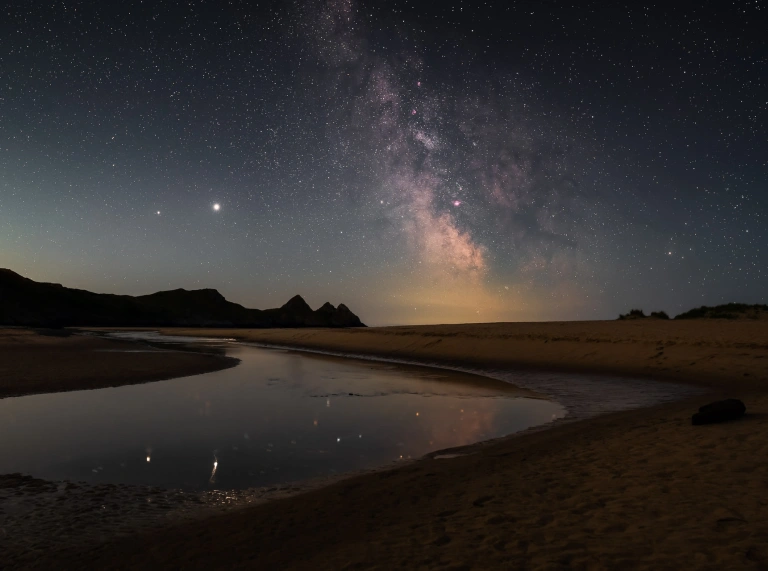 A view of the beach at night.