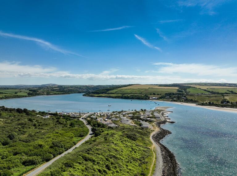 A view of the estuary surrounded by land.