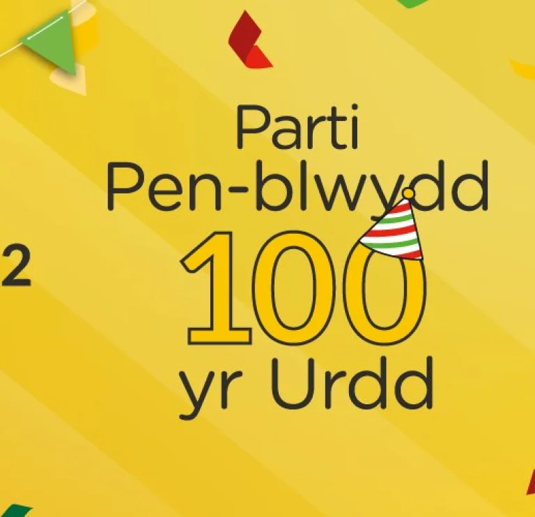 A sign advertising Part Pen-blwydd 100 yr Urdd