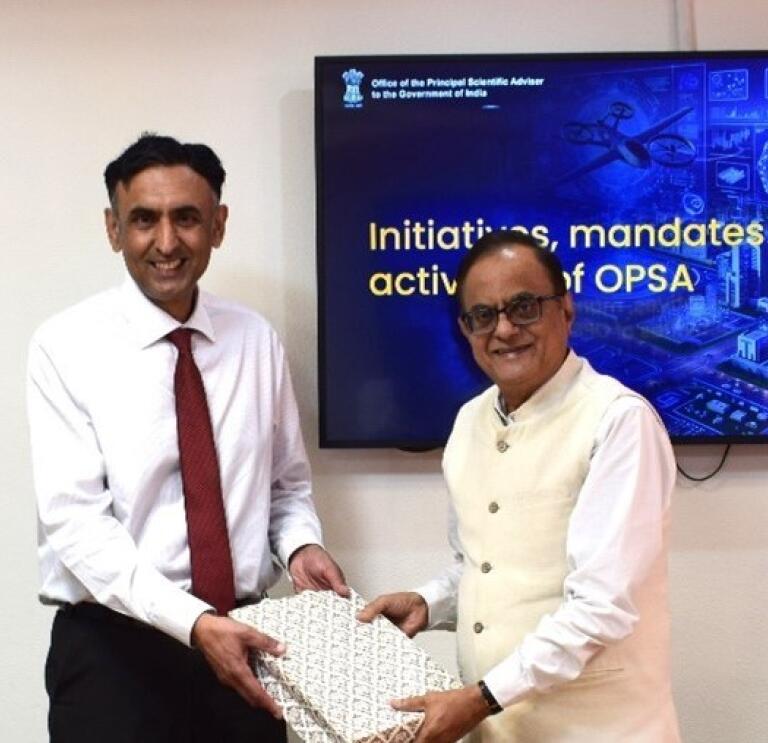 Chief Scientific Advisor and India's Principal Scientific smiling together 