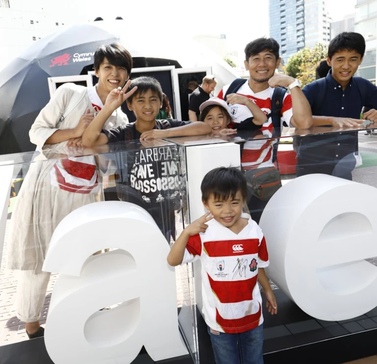 A group of people smiling at the camera.