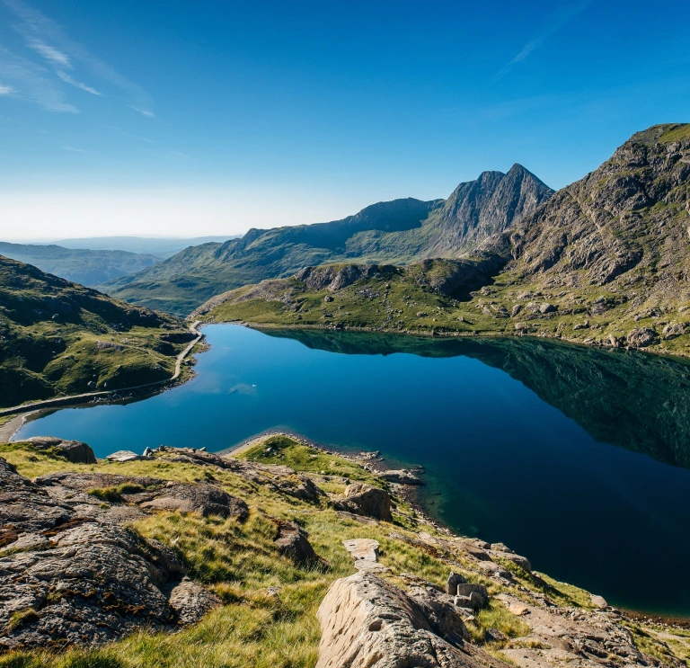 Blue lake surrounded by high mountains