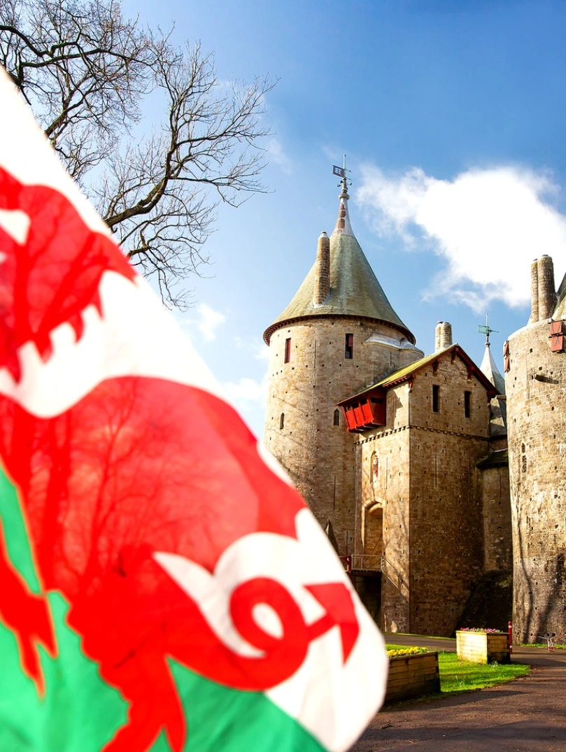 Welsh flag flying in front of castell coch