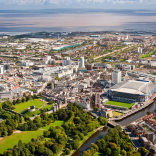 Aerial view of city centre and Bristol Channel, Cardiff, South East Wales