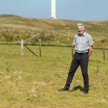 Derek Walker standing in a field
